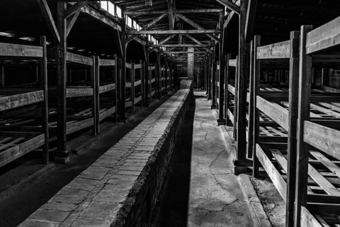Auschwitz, Poland - 15 September, 2021: black and white view of view of the interior of one of the