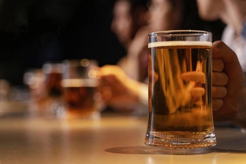 Close up hand holding beer mug. Resolution and high quality beautiful photo