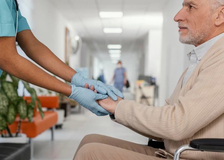 Close up health worker helping patient