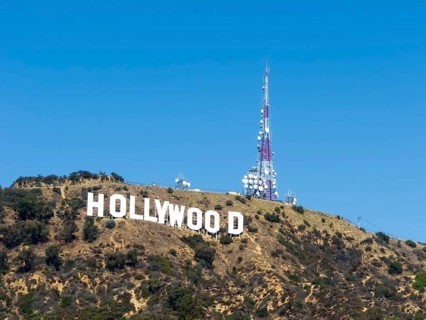 The Hollywood Sign (formerly the Hollywoodland Sign) is a landmark and American cultural icon