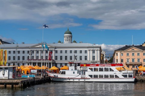 Helsinki, Finland: 4 August, 2021: a sightseeing boat in the harbor in Helsinki with tourists on a