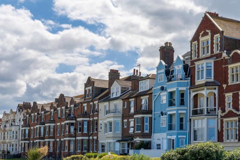 Cromer, United Kingdom - 13 June, 2022: colorful English rowhouses and town houses in the historic