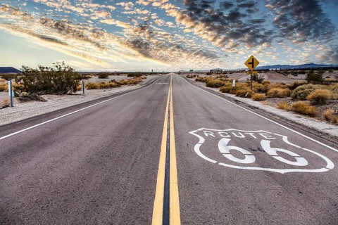 Route 66 in the desert with scenic sky. Classic vintage image with nobody