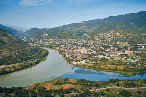 Panoramic view of the Aragvi and Kura rivers confluence and Mtskheta city seen from Jvari monastery