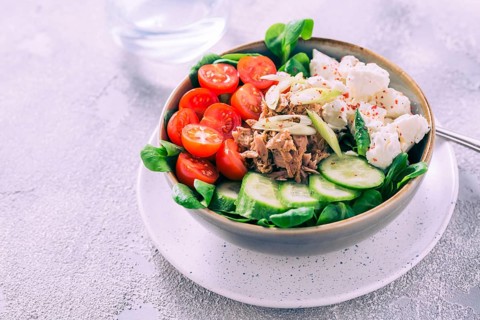 Vegetarian buddha bowl. Raw vegetables and tuna in a one bowl. Vegetarian, healthy, detox food