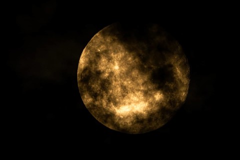 Super moon one day after full moon, moon behind clouds, Braunschweig, Lower Saxony, Germany, Europe