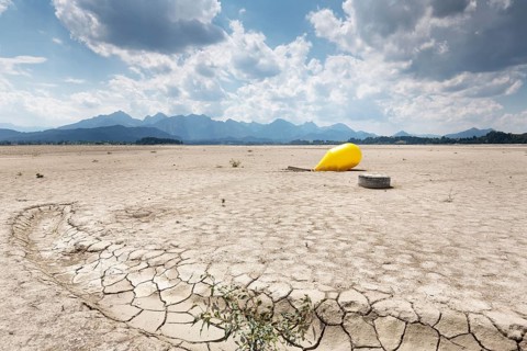 Buoy in the waterless Forggensee in Ostallgäu, Germany, Europe