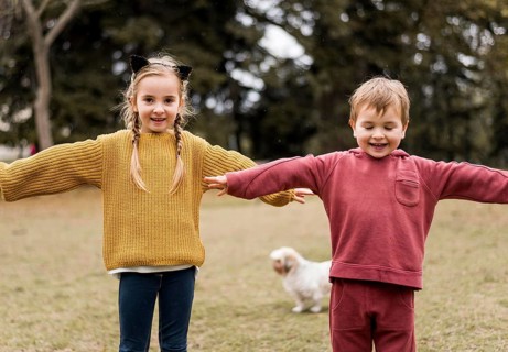 Front view smiley kids playing