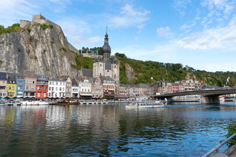 Belgium - 11 August 2019: view of the small town of Dinant with Maas river and citadel and