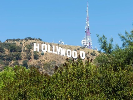 The Hollywood Sign (formerly the Hollywoodland Sign) is a landmark and American cultural icon
