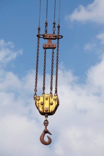Orange cargo hook with carabiner on a harbour crane, Elsfleth, Lower Saxony, Germany, Europe