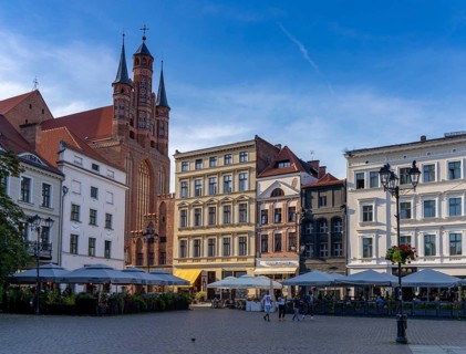 Torun, Poland - 6 September, 2021: view of the main square in historic old town of Torun with Saint