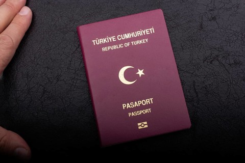 New Turkish passport. Travel, tourism, emigration and passport control concep
