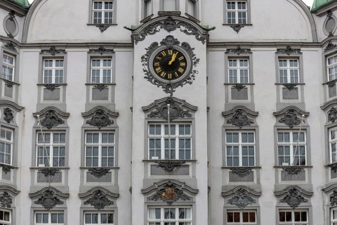 Detail of the historic town hall with Renaissance-style clock on the market square in the old town