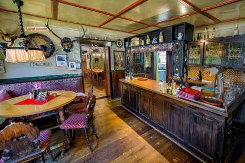 Regulars' table and bar in the Gasthof Adler, heritage-protected historic country inn, built around