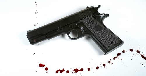 Pistol against Black background