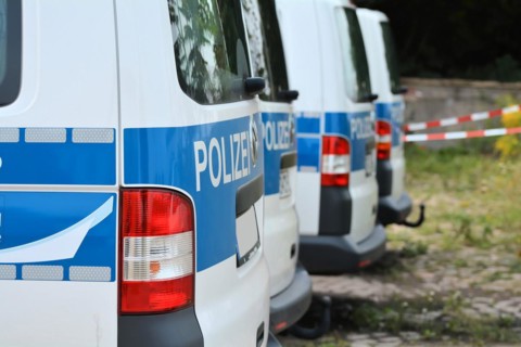 Parked police car during a police operation