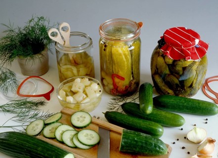 Preserved mustard gherkins and pickled cucumbers Still life