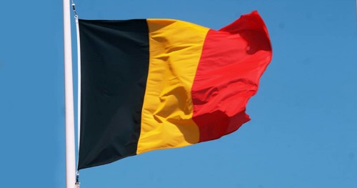 Belgian Flag Waving in the Wind against blue sky
