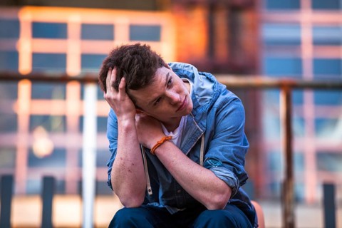 young man lost in thought