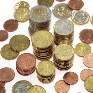 Piles of Euro Coins against White Background