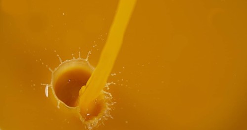 Orange Juice being poured