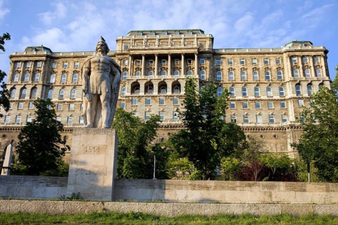 Buda Castle (Royal Palace) rear view, 18th century Baroque style facade and the Dozsa Statue in