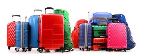 Luggage consisting of large suitcases and rucksacks isolated on white