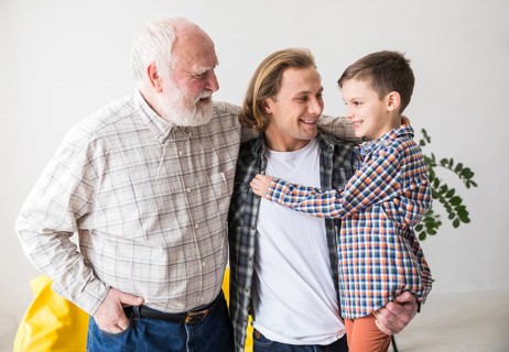 Family men different generations hugging together