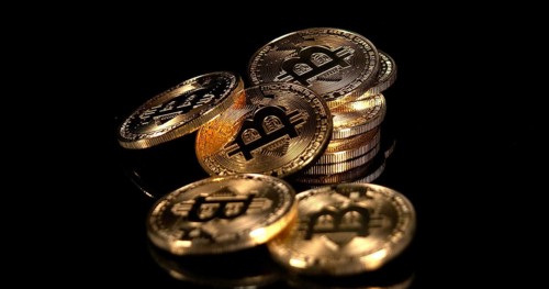 Bitcoins on Black Background
