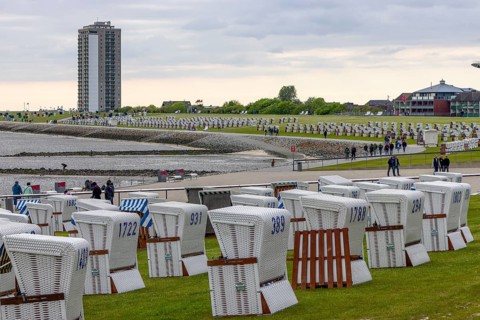Beach chairs, green beach, high-rise building, Büsum, North Frisia, Schleswig-Holstein, Germany,