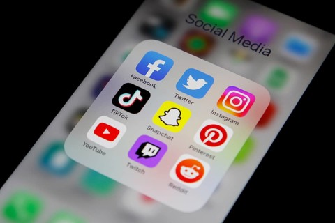 Social media icon, detailed view of a smartphone with social media apps, Facebook, Twitter,