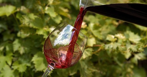 Red Wine being poured into Glass