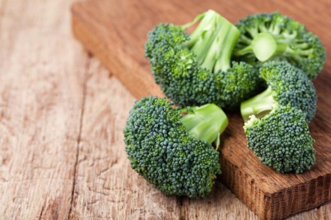 fresh broccoli on a wooden table