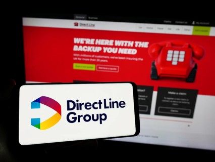 Stuttgart, Germany, 12-08-2023: Person holding smartphone with logo of British financial company