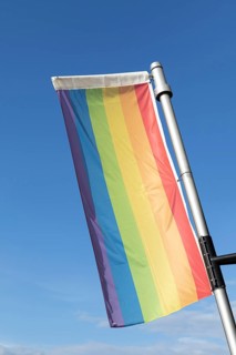 Symbolic image, homosexuality, tolerance, CSD, Pride Week, rainbow flag against blue sky, Germany,