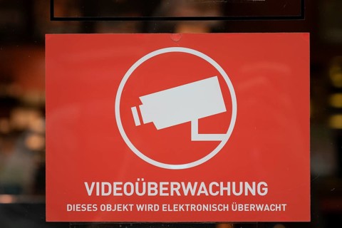 Symbolic image, close-up, sign indicating video surveillance to protect against theft in retail,