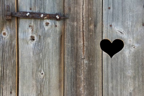 Old wooden door with heart