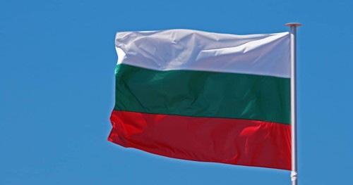 Bulgarian Flag Waving in the Wind against blue sky