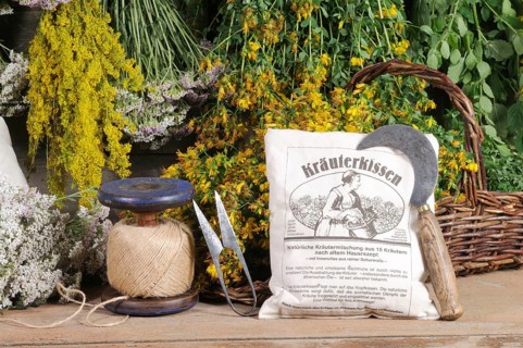 Herbal pillows and herbs hung to dry, St. John's wort, yarrow, mint, lemon balm, bedstraw