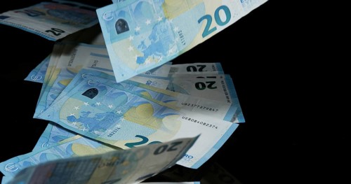 Euros Money Falling against Black Background