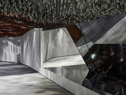 Futuristic interior with geometric shapes and reflective, metallic surfaces, interior design