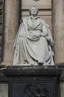 An upright shot of a statue to Germany's most famous poet and writer Johann Wolfgang (von) Goethe