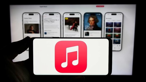 Stuttgart, Germany, 09-23-2023: Person holding smartphone with logo of streaming service platform