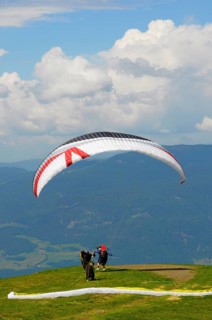 Schlern area in South Tyrol, Alpe di Siusi, paragliders at take-off