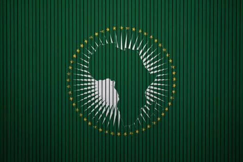African Union Flag painted on the cracked grunge concrete wall