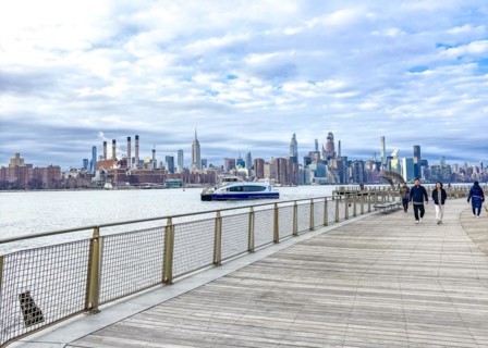 Domino Park waterfront promenade, Williamsburg, with a view across the East River to the Manhattan