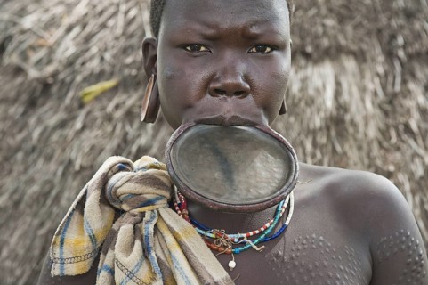 Surma woman with round lip plate, lip plate, Kibish, Omo Valley, Ethiopia, Africa