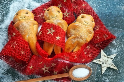 Grittibänz, Swiss version of the Stutenkerl made from yeast yeast dough with sultanas and sugar,