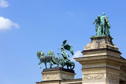 Millennium Monument on the Heroes Square in Budapest, Hungary with statues symbolizing Peace,